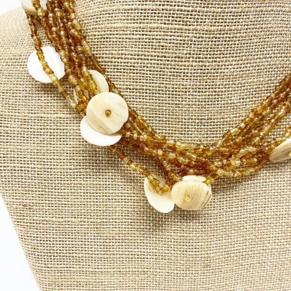 8 Strands of Brown & Amber Beaded Necklace